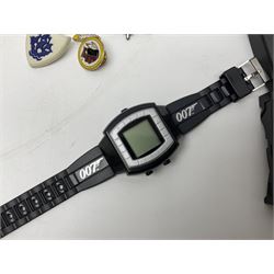 Three Sekonda wristwatches, together with other wristwatches, enamel badges and collectable badges