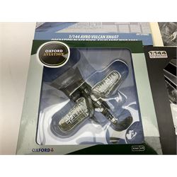 Fourteen die-cast models of aircraft including four Oxford Aviation, two Military Giants of the Sky, two Ixo Models, Corgi Warbirds Messerschmitt, Atlas Editions Spitfire and Messerschmitt, two Hobby Master etc; and two die-cast models of tanks; all boxed (16)