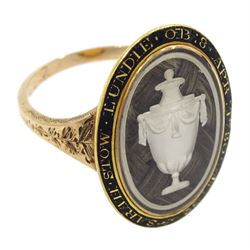 George III gold mourning ring, the bezel enclosing a lock of plaited hair under a reverse white painted urn glass panel, the black enamel border inscribed 'Sarah Stow Lundie OB 8 Apr 1780 AE 32'