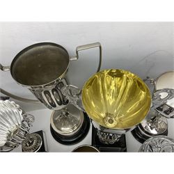 Collection of silver plated and metal trophy cups and winners plaques, all relating to the Burniston and District Show, most engraved with competitions and winner's names, in three boxes 