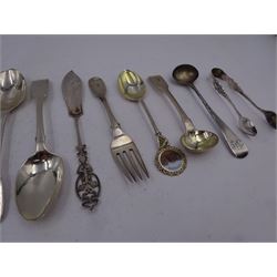 Group of silver flatware, including pair of George IV Irish silver Fiddle pattern teaspoons, hallmarked Charles Marsh, Dublin 1829, pair of sugar tongs with ornate embossed decoration, hallmarked G E Walton & Co Ltd, Birmingham 1910, butter knife with openwork handle, hallmarked John Round & Son Ltd, Sheffield 1903, and other silver spoons, all hallmarked with various dates and makers