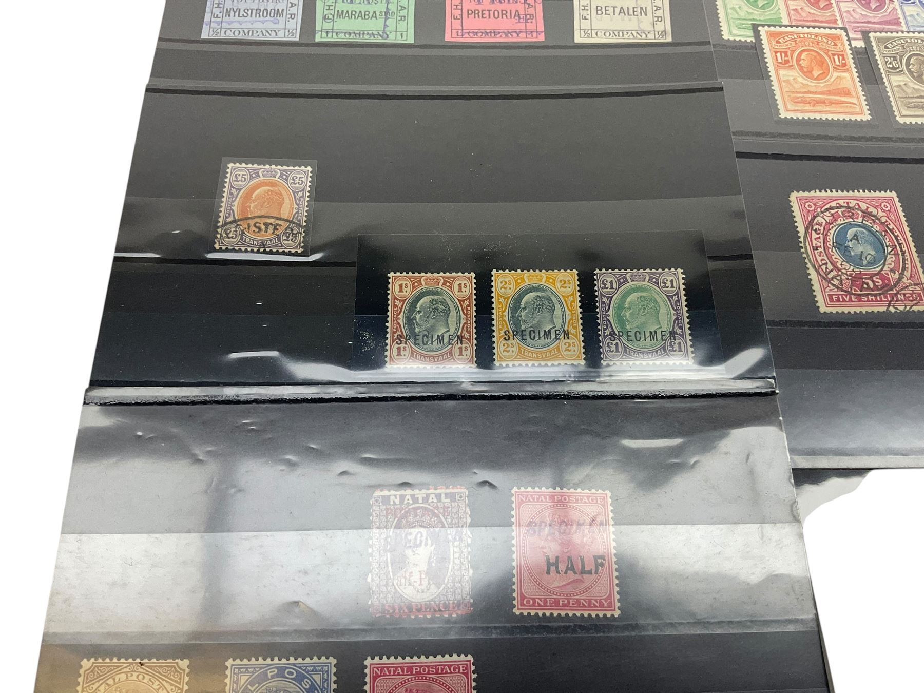 Transvaal King Edward VII 1903 five pounds with 'registered' cancel, Natal King Edward VII 1908/9 one pound, Basutoland King George V 1933 set of ten to ten shillings and other stamps with specimen overprints etc