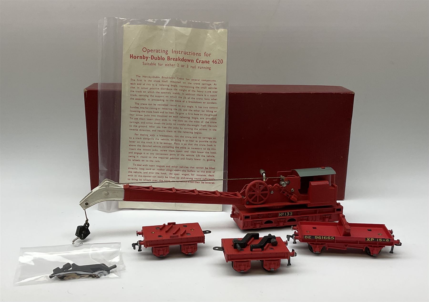 Hornby Dublo - Breakdown Crane No.4062 with screw jacks in plain red box with end label; D1 Girder Bridge, boxed; and T.P.O. Mail Van Set, boxed with mail bags (3)