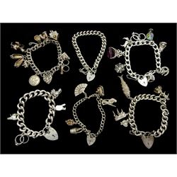 Six silver charm bracelets, charms including cuckoo clock, Donald duck, spiders web, keys, hedgehog and matador