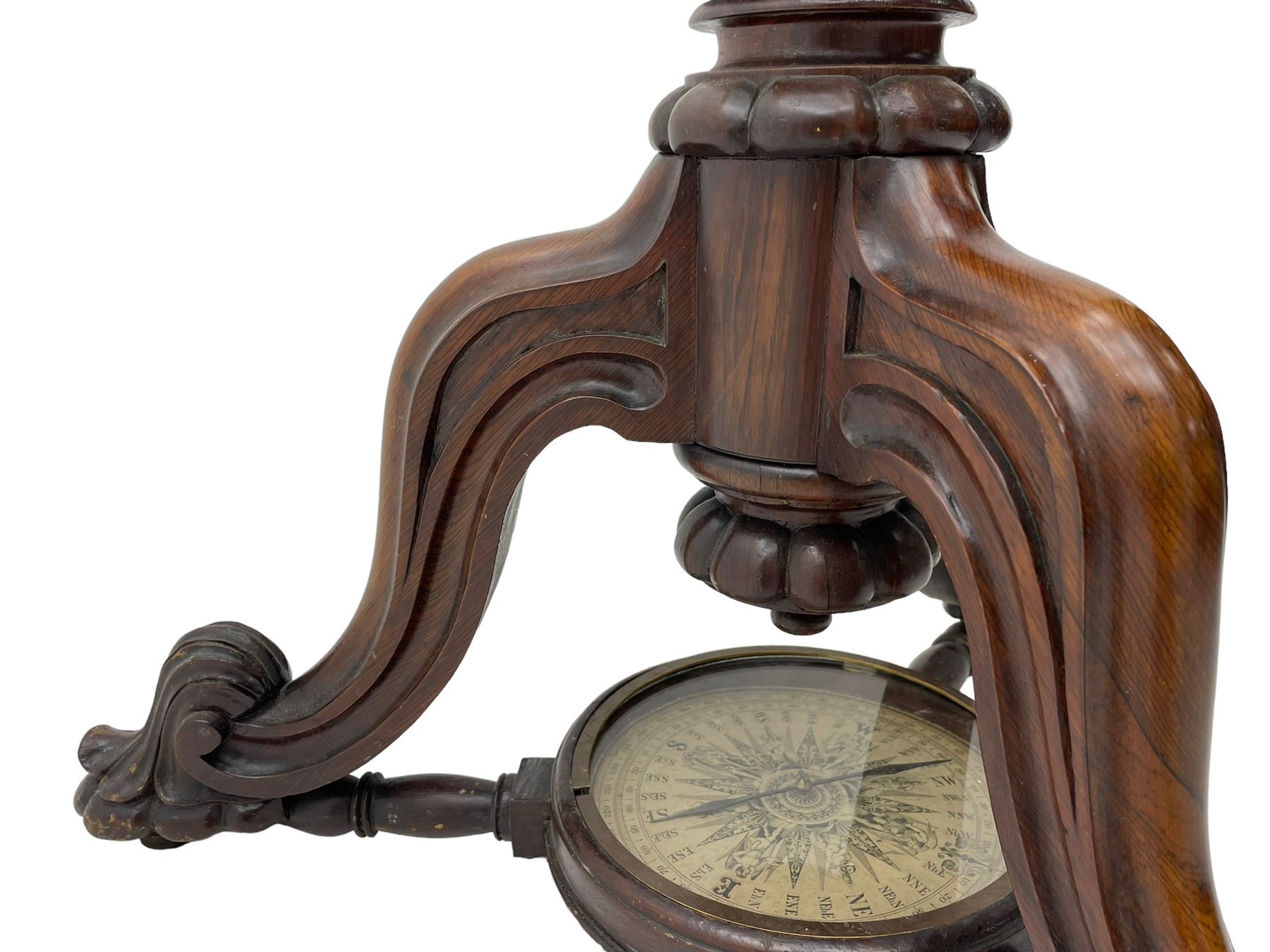 19th century brass terrestrial armillary sphere on rosewood base, lobe carved column on three splayed supports with scrolled carved terminals, the supports united by circular compass with turned stretchers