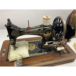 Cased sewing machine, together with bed warmer and copper hunting horn