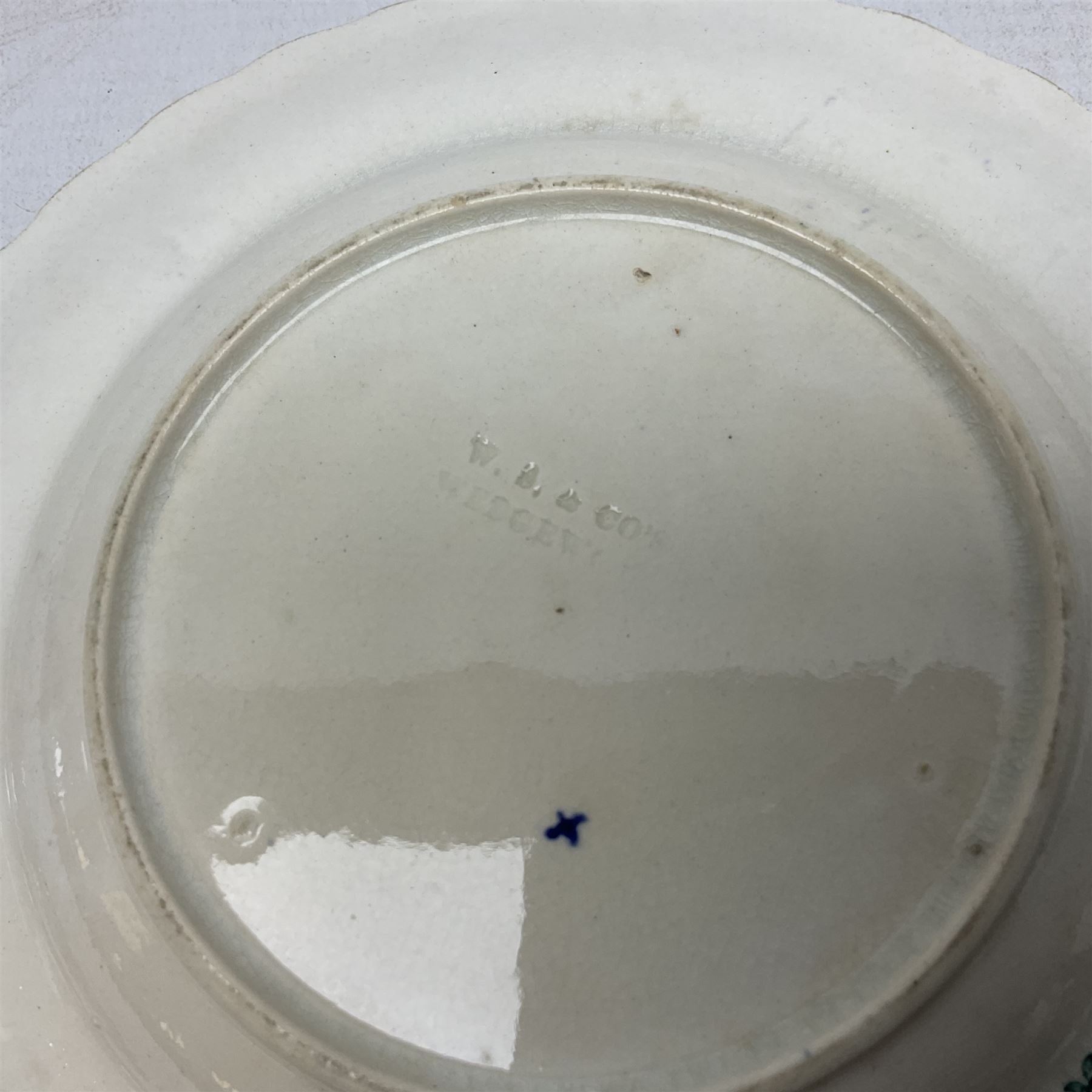 Collection of 19th century William Smith & Co nursery plates, to include examples decorated in the pastime series, and similar, all with moulded floral borders