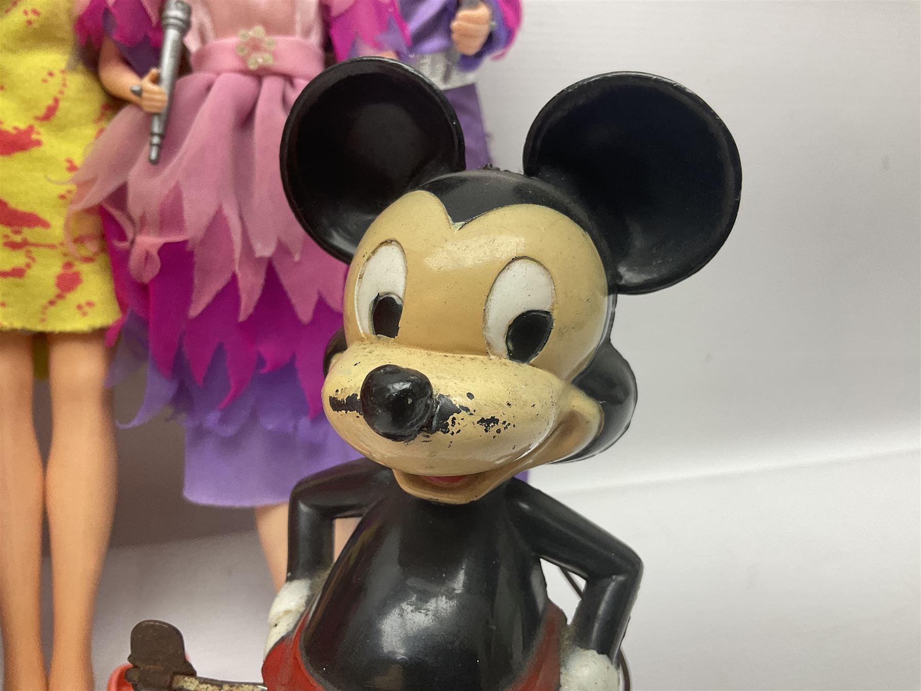 Pelham Puppet - Tyrolean Girl in yellow box; three 'A' Team action figures; clockwork plastic Mickey Mouse figure; and seven various fashion dolls (12)