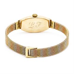 Omega early 20th century ladies 9ct rose gold manual wind wristwatch, silvered dial with Arabic hour markers, back case engraved with initials 'L.F', Edinburgh import mark 1931, on tri-coloured gold bracelet, with adjustable clasp, stamped 9ct