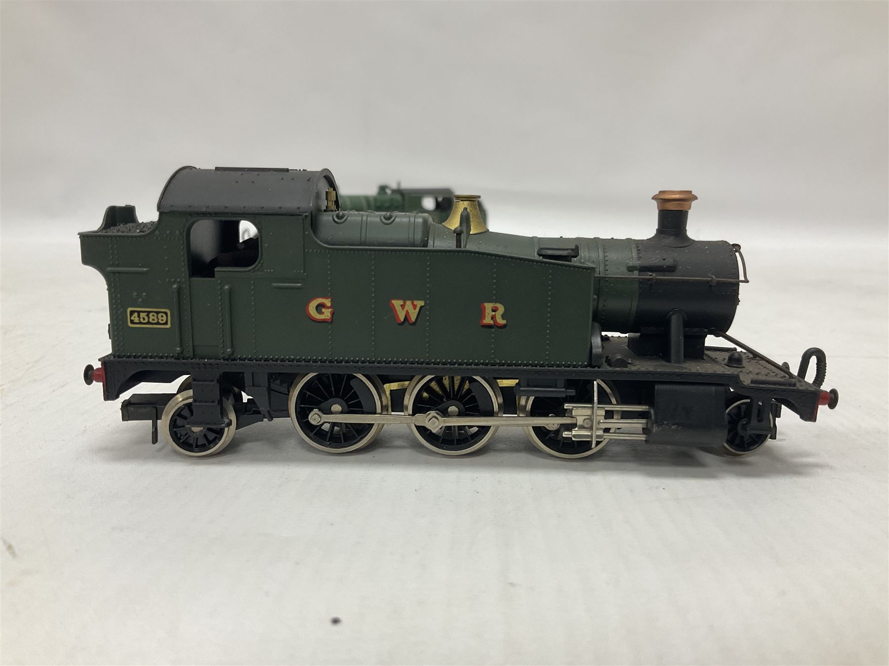 ‘00’ gauge - three kit built locomotives comprising Class J83 0-6-0T no.8477 finished in LNER green; GWR Class 4575 2-6-2T no.4589 finished in GWR green; GCR Class 9N/A5 4-6-2T no.169 finished in GCR green (3) 