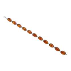 Silver oval Baltic amber link bracelet, stamped 925