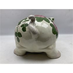 Large ceramic figure of a pig decorated with roses, L45cm