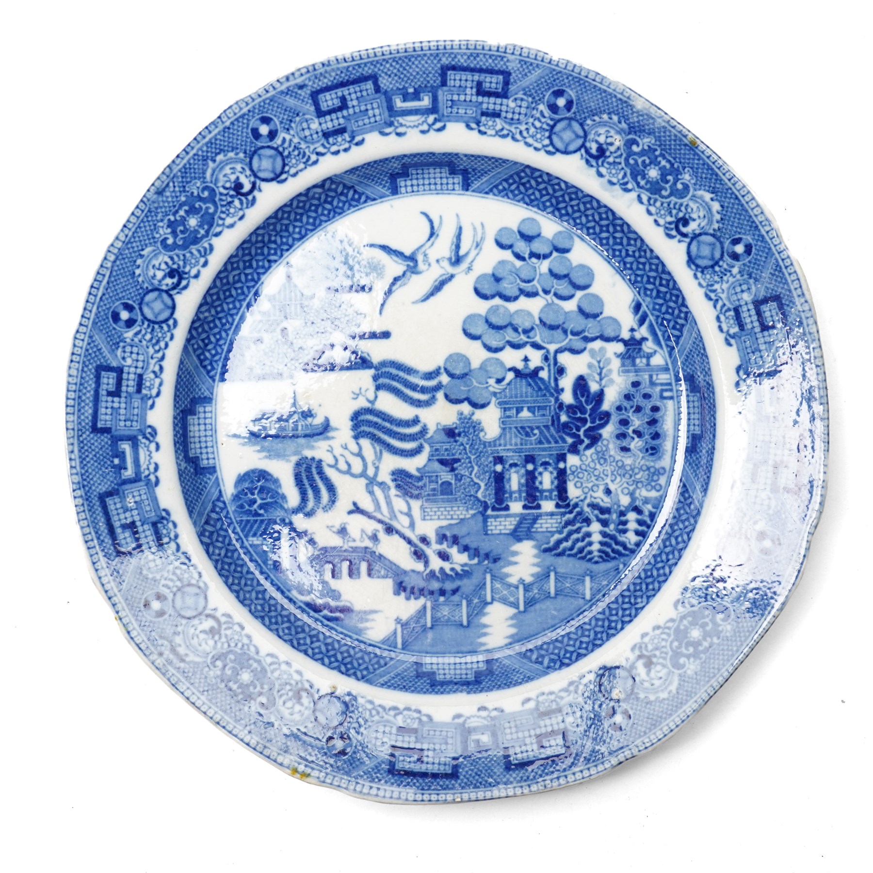 Five 19th-century willow pattern plates, two small meat platters and three plates, largest D24.2cm (5) 
