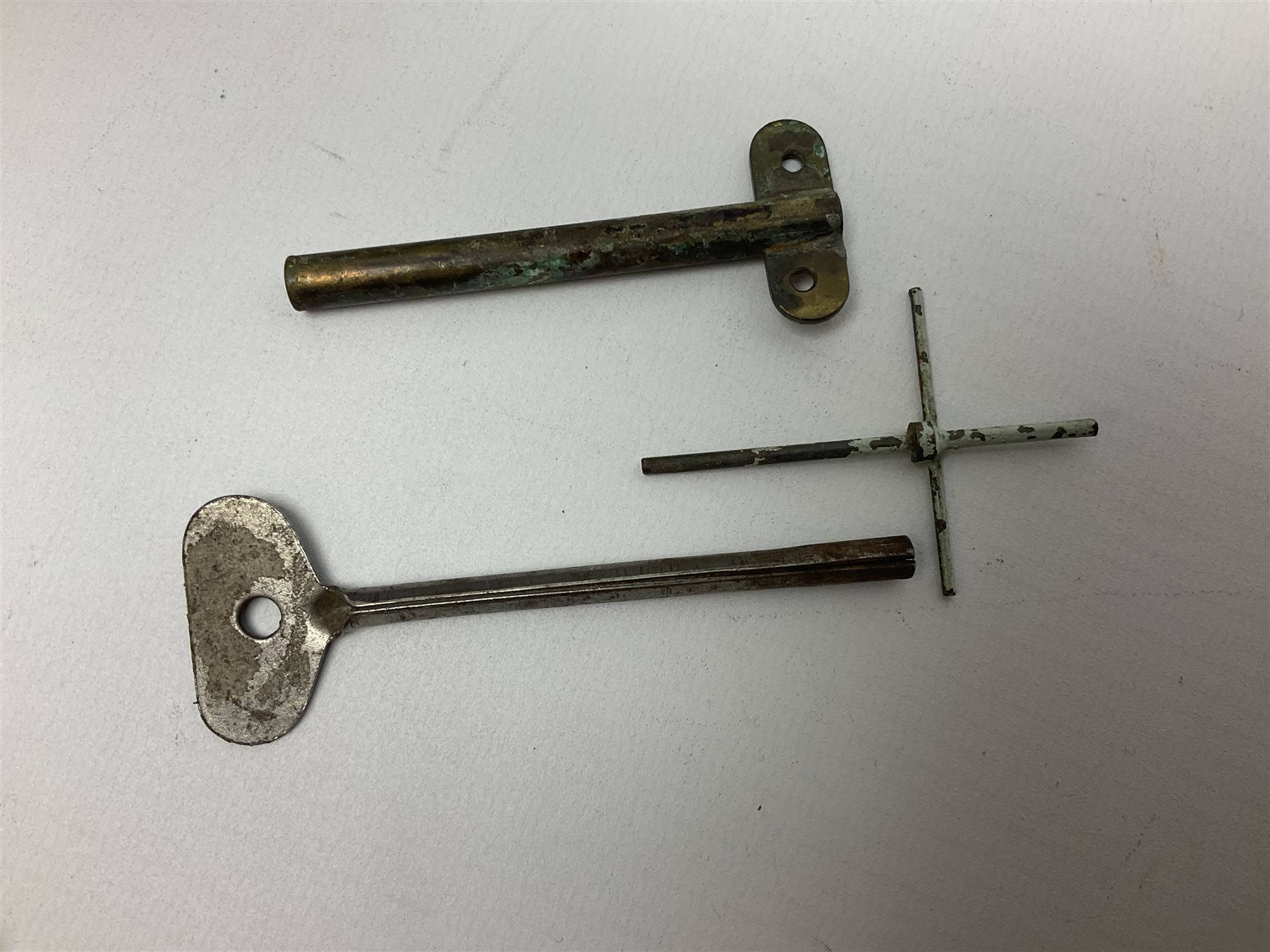 Pre-war Sutcliffe Grenville tinplate clockwork Battleship, with black and grey hull, grey deck and upper decks, propeller and rudder, length 32cm; with manuscript biographical details and two keys, unboxed