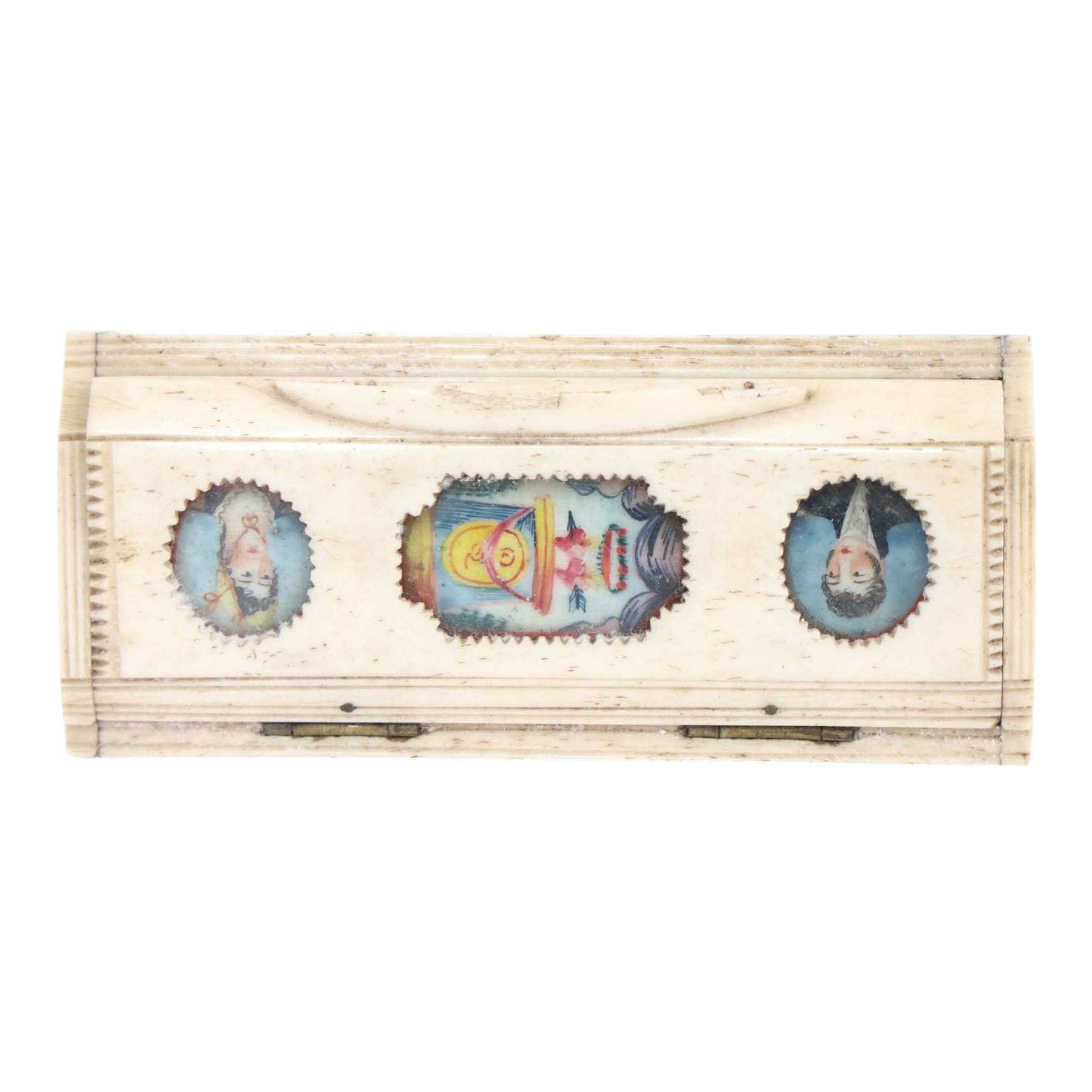 French Napoleonic Wars prisoner of war bone snuff box 1805-20, with coloured insets in the hinged lid depicting a man and woman facing each other with a central image of two hearts pierced with an arrow, H2cm, L9cm 
