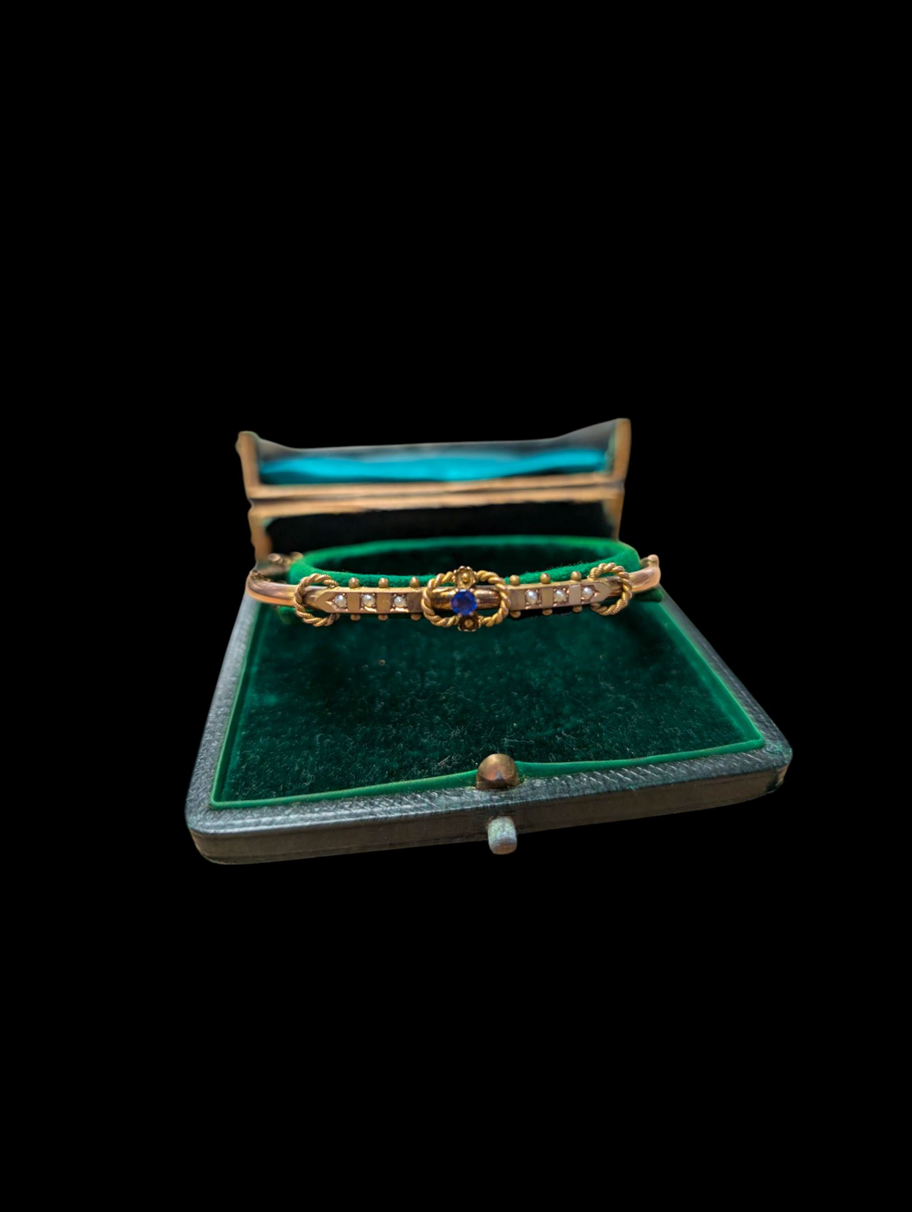 9ct gold stone set bangle, boxed