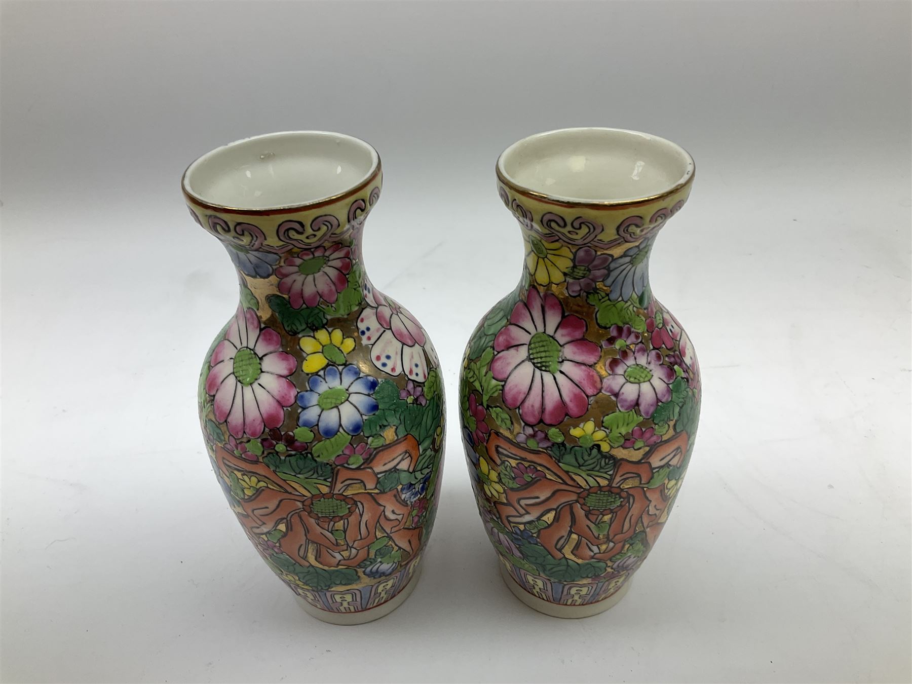 Collection of mostly Oriental ceramics, to include three 20th century Japanese Satsuma vases, two Japanese Imari plates, etc. 