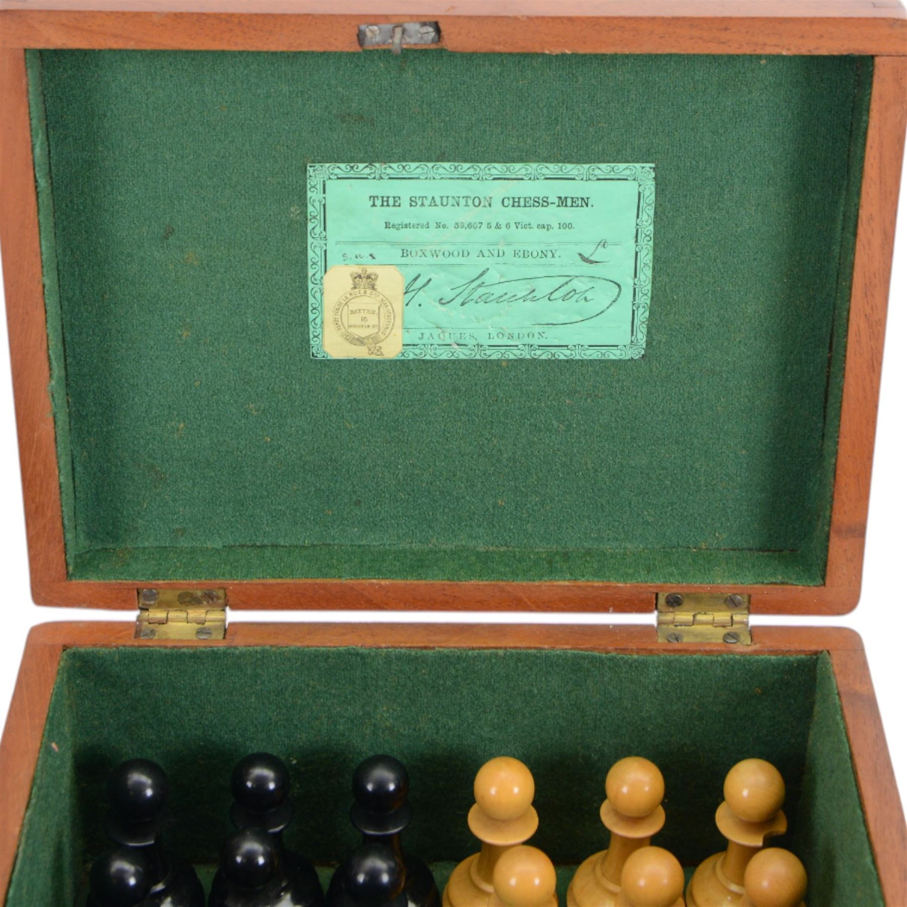 Jaques 'The Staunton Chess-Men' boxwood and ebony chess set, in original brass mounted mahogany box with paper label to interior, only the boxwood king stamped Jaques London, some pieces marked with red crown, boxwood king H11cm