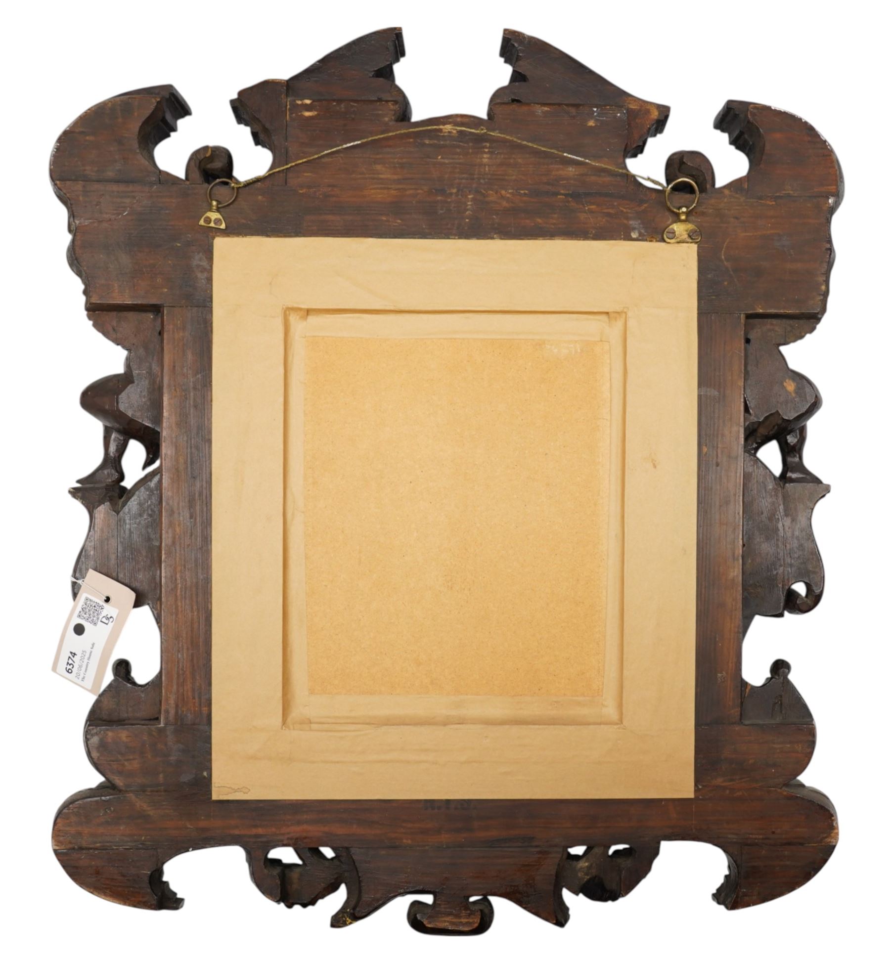 Renaissance-style mid 19th century carved fruitwood wall mirror, carved top surmounted by ‘broken’ arched pediment with central putti figure and grape vine, the sides with two putti figures above C-scroll decorations, and with a similarly carved base
