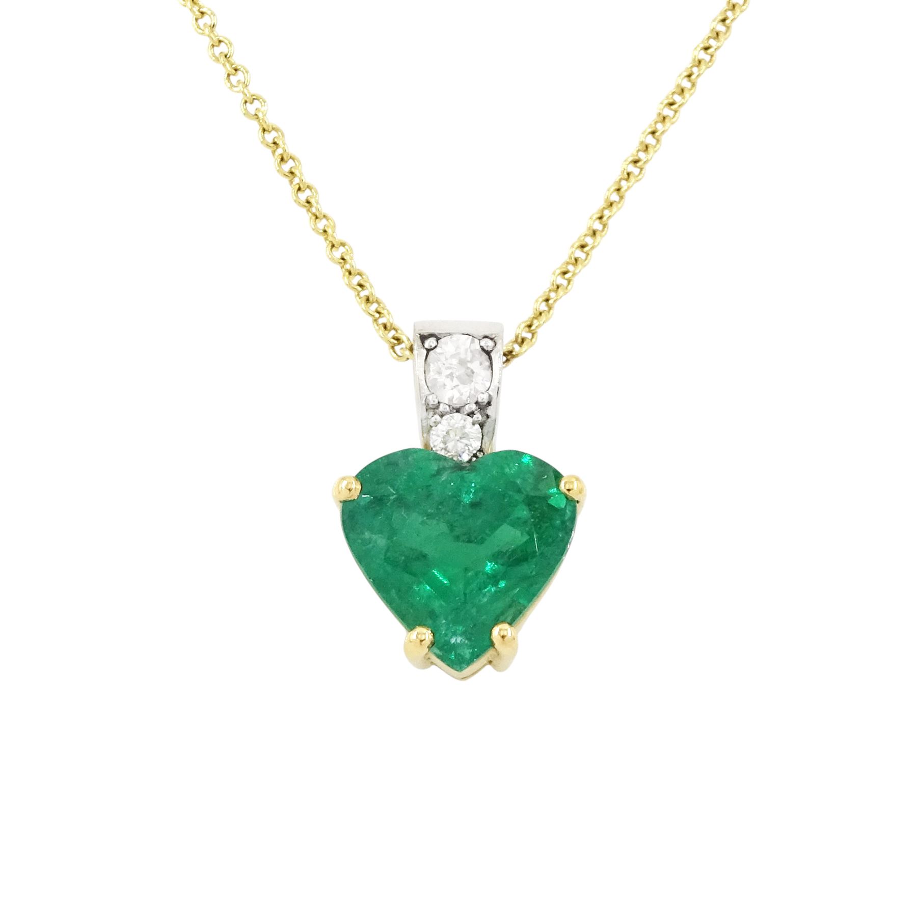 18ct and platinum emerald and diamond pendant necklace, the single heart cut emerald of 3.48 carat, the bail set with two old cut diamonds, London 2019, on an 18ct gold trace link chain necklace, with Alan Poultney Gems report, the emerald with The Gem & Pearl Laboratory report