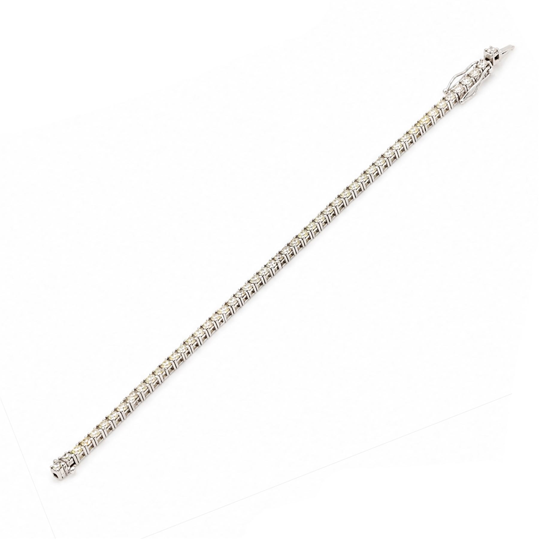 18ct white gold diamond bracelet, fifty-nine round brilliant cut diamonds, stamped 750, total diamond weight 4.29 carat