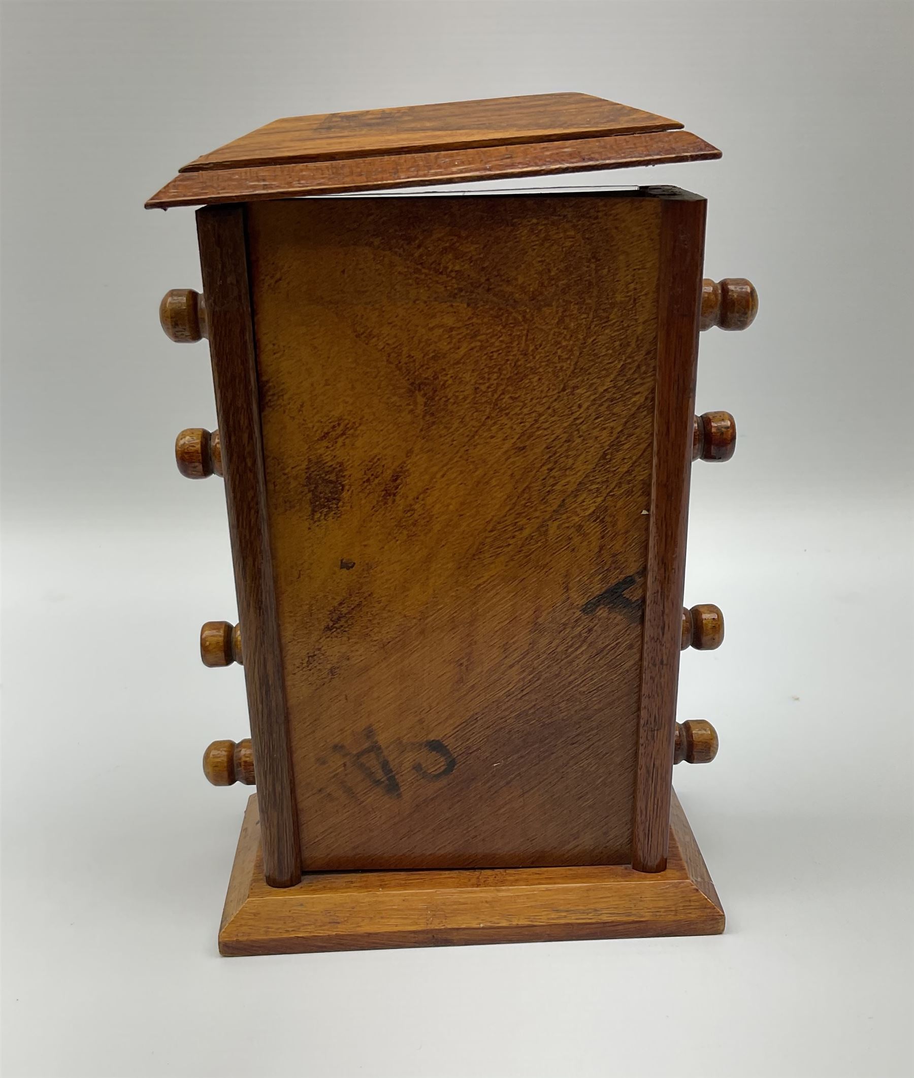 An early 20th century oak perpetual desk calendar, with three glazed apertures for day, date and month, H20cm