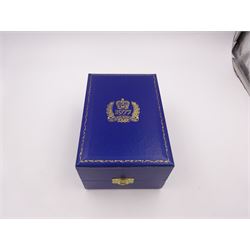 Modern limited edition silver goblet, commemorating Queen Elizabeth II silver jubilee, of plain form with gilded interior, applied Royal coat of arms to body and engraved 'The Queen's Silver Jubilee 1952-1977' upon knopped stem and circular spreading foot, limited edition no. 320/1000, hallmarked A T Cannon Ltd, Sheffield 1977, boxed with certificate, goblet H12.8cm