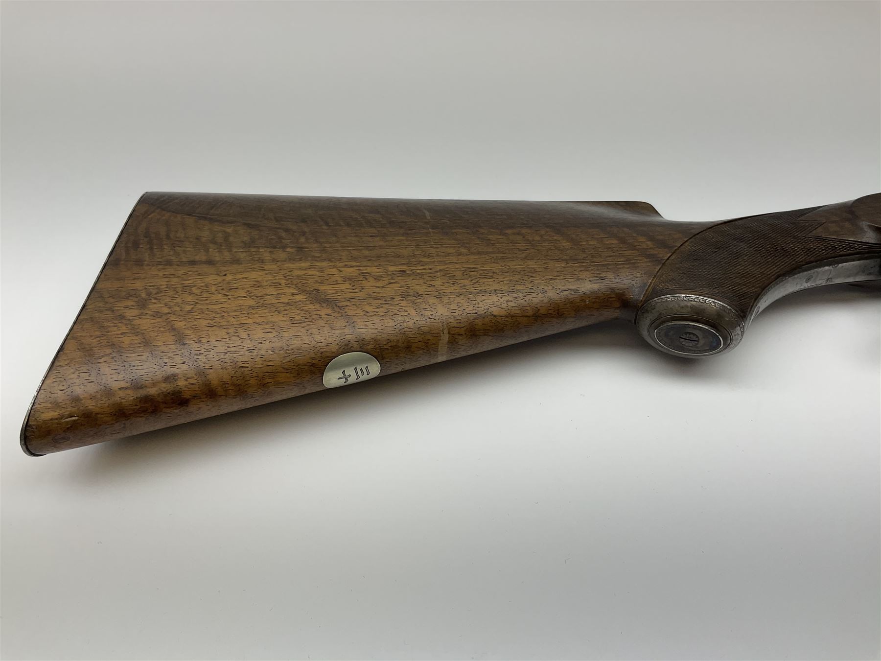 Rare Henry Pieper Liege seven-chambered solid barrel 297/30 calibre rim-fire volley gun with six barrels around a central seventh barrel drilled for simultaneous fire, built on a Remington type rolling block action, blued 62cm barrel with raised rib and twin rear leaf sights, case hardened action complete with loading plate for seven cartridges, walnut stock with chequered pistol grip and fore-end and inset 'silver' cartouche with two Chinese type characters, no.256PLN, L109cm overall