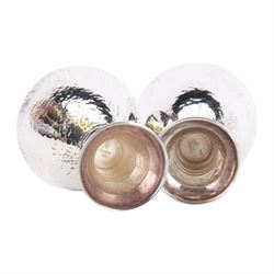 Pair of 20th century Greek silver metal goblets, each with planished tapering bowl upon a knopped stem and stepped spreading foot, marked Lalaounis 925, H10.5cm
