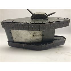 Large clockwork model of a WW1 Tank made of tin-plate and aluminium, with moving side cannons, the clockwork chain driven movement driving the articulated tin tracks; L28.5cms  W16.5cms and H13.5cms