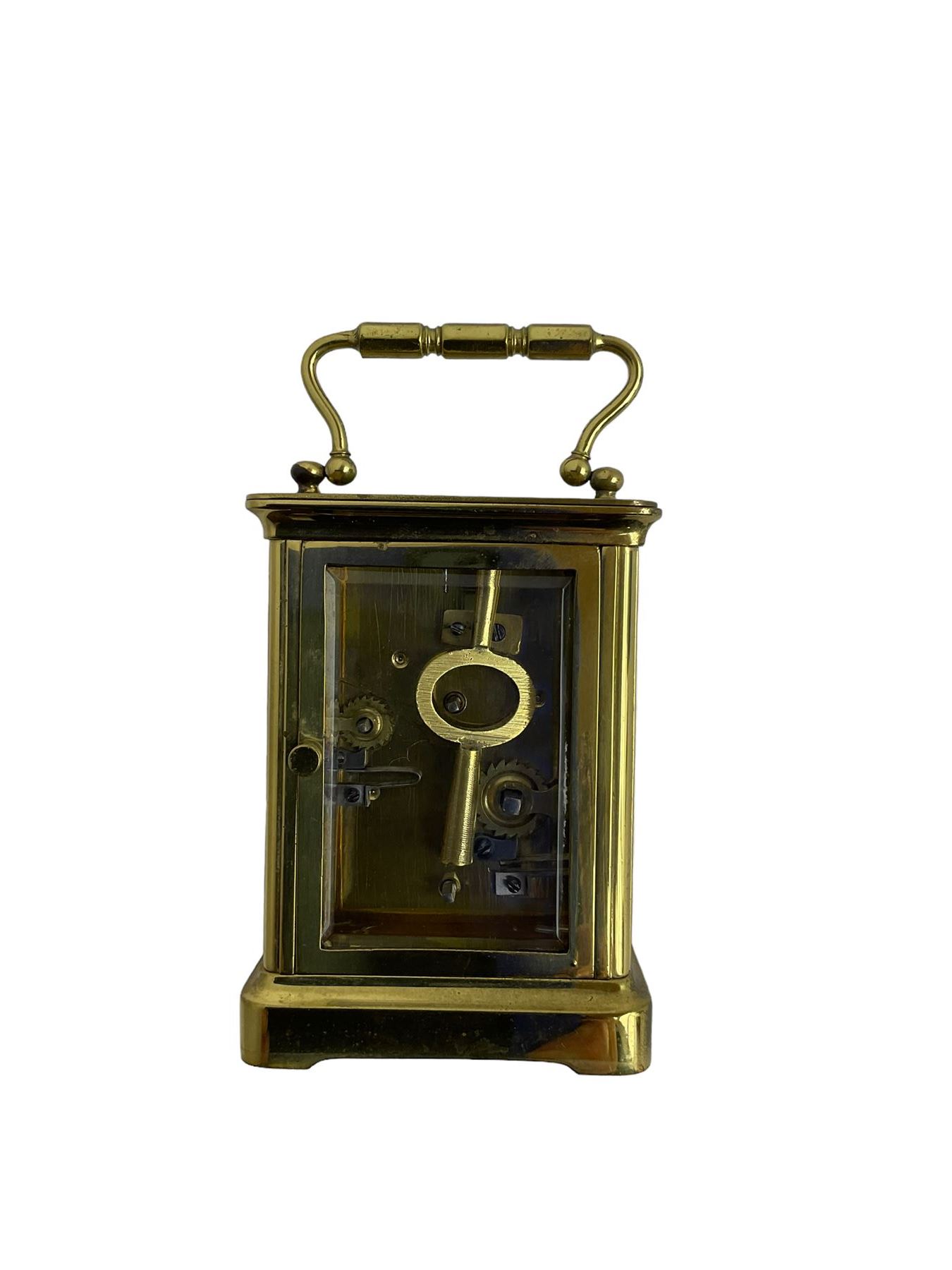 French - 19th century 8-day carriage clock with alarm, corniche case with an enamel dial, Roman numerals, minute markers and alarm setting disc, with a cylinder platform escapement, sounding the alarm on a bell. With key.