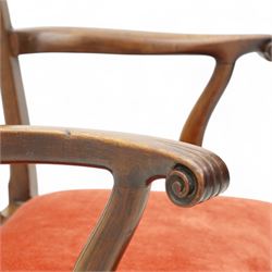 George III mahogany open elbow chair, shaped cresting rail over pierced splat, shaped arms with scroll carved terminals, drop-in seat upholstered in red fabric, on square supports with moulded edge united by plain stretchers 