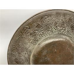 Arts and Crafts Keswick School of Industrial Arts copper charger, decorated with planished centre and repousse scrolling foliate tendrils to rim, D44cm