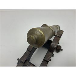 Table top brass cannon,  upon wooden base, together with three framed displays of Oriental decorative items, cannon tallest point H15cm