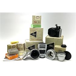 Leica Leitz camera accessories including 'Otdym - Visoflex II', 'Ocmor Elmar 1:3.5/65' serial number 1748614, 'OTZFO' and 'OTXBO' all in original boxes and various other mostly Leica Leitz accessories including lens filters etc