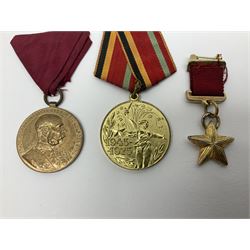 Fourteen assorted continental medals including Russian, Austrian etc