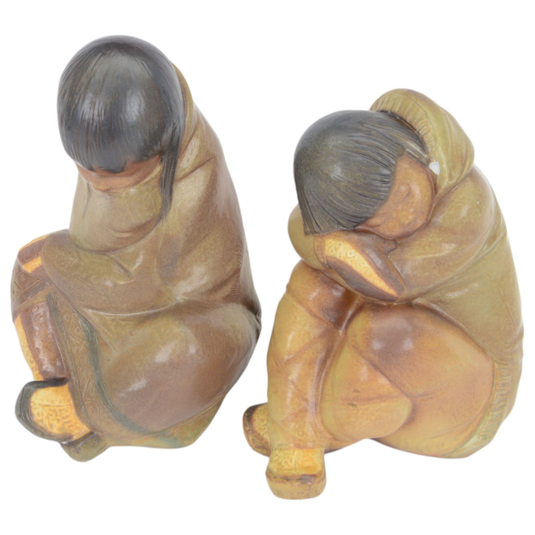 Two Lladro Gres figures, composing Eskimo Girl and Eskimo Boy, largest H31cm