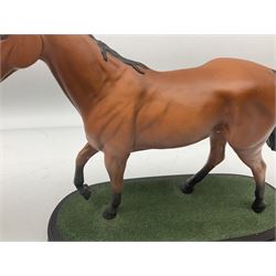 Beswick 'Mill Reef' horse figure, on a wooden plinth together with Beswick Ware horse figure 'Red Rum' on wood plinth, both with printed mark beneath