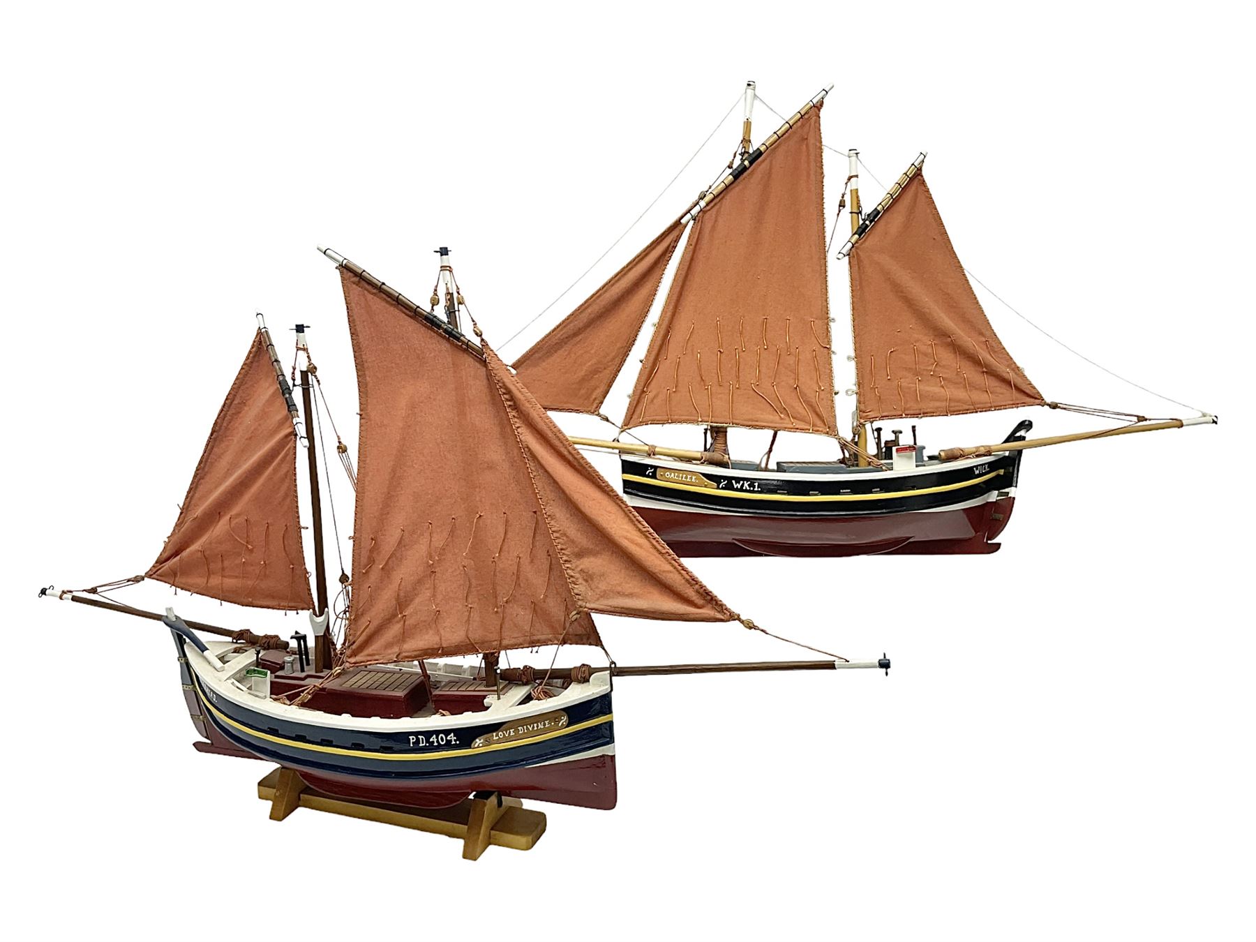 Wooden model of the Peterhead Herring Fishing Boat, Love Divine, PD404. on stand together with Wick Herring Fishing Boat, Galilee WK.1. on stand, L105cm, H64cm