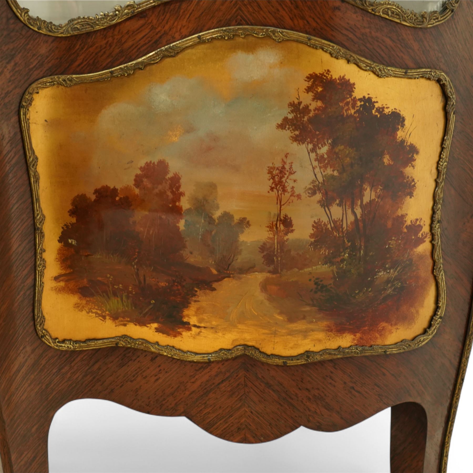 Louis XV revival kingwood Vernis-Martin serpentine fronted vitrine cabinet, arched top with gilt brass foliate mounts, glazed door with two shelves above three painted panels, depicting pastoral scenes, supported on out-swept cabriole legs with gilt brass mounts and sabots.