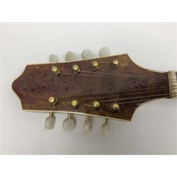 F-hole eight-string mandolin with one-piece maple back and ribs and spruce top L70cm