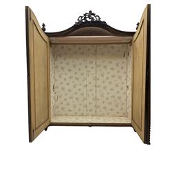 Early 20th century Italian walnut armoire wardrobe, the pierced and scrolling pediment carved with acanthus leaf detail, flanked by two scrolling cartouche with matching corbels below, the two panelled doors with applied carved rinceaux slips, with a central spiral turned upright, enclosing single shelf and hanging rail, raised on scroll feet