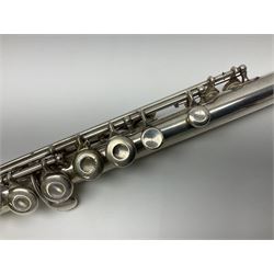 Boosey & Hawkes London Regent three-piece flute, serial no.345447; in B&H Bandhite hard carrying case; and Deg Music Company Inc. USA Claudel Model three-piece flute, serial no.491718, in hard carrying case (2)