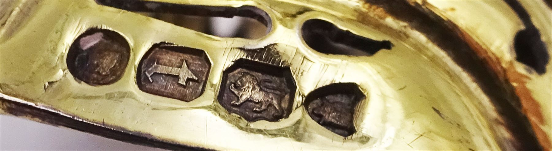 Victorian silver-gilt sugar sifting spoon, with gilded pierced shell shaped bowl, the handle decorated in relief with classical greek figures amongst fruiting vines, hallmarked Henry John Lias & James Wakely, London 1874,  L16cm, contained within tooled leather silk and velvet lined fitted case