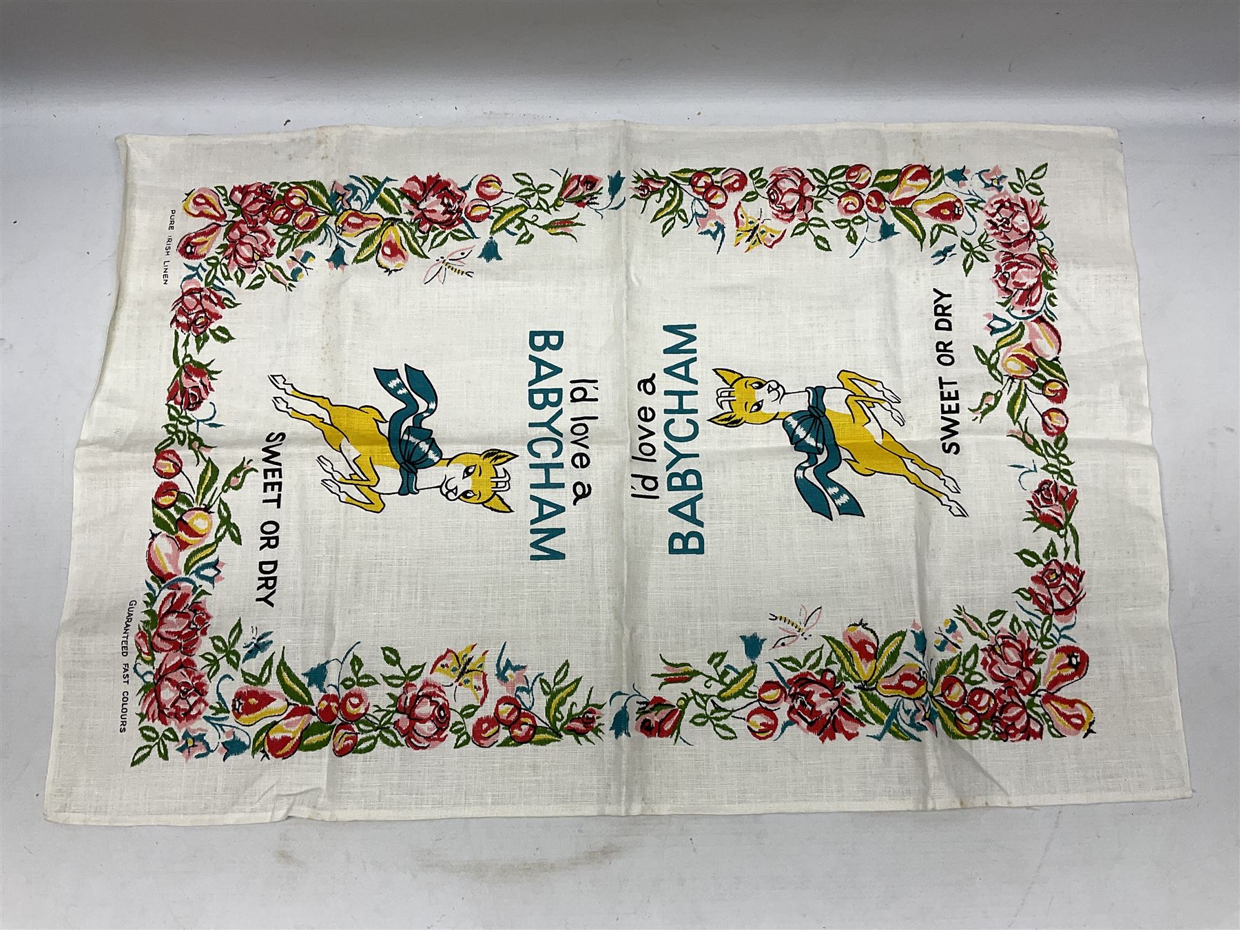 Breweriana; Eight Babycham glasses together with a Babycham plastic fawn mascot and linen I'd Love a Babycham tea towel