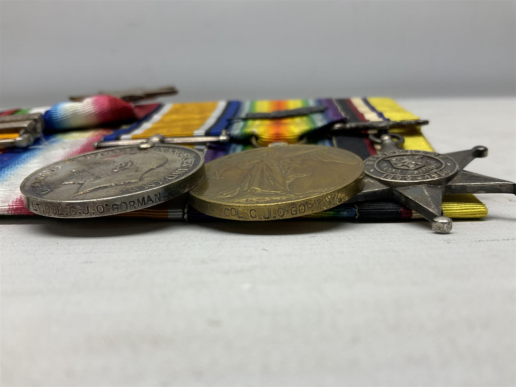 South Africa/WW1 Distinguished Service Order group of seven medals comprising D.S,O. with original ribbon bar and top bar slider, Queens South Africa Medal with three clasps for Defence of Kimberley, Orange Free State and Transvaal, Kings South Africa Medal with two clasps for South Africa 1901 & 1902 awarded to Capt. C.J. O'Gorman D.S.O. R.A.M.C., 1914-15 Star, British War Medal and Victory Medal with MID oak leaves awarded to Major (later Lt. Col.) C.J. O'Gorman D.S.O. R.A.M.C. and Kimberley Star 1899-1900; together with copies of research and biographical material