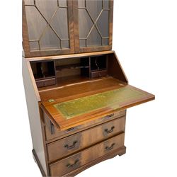 Reproduction mahogany bureau bookcase, the glazed bookcase over fall front bureau fitted with four drawers, on bracket feet