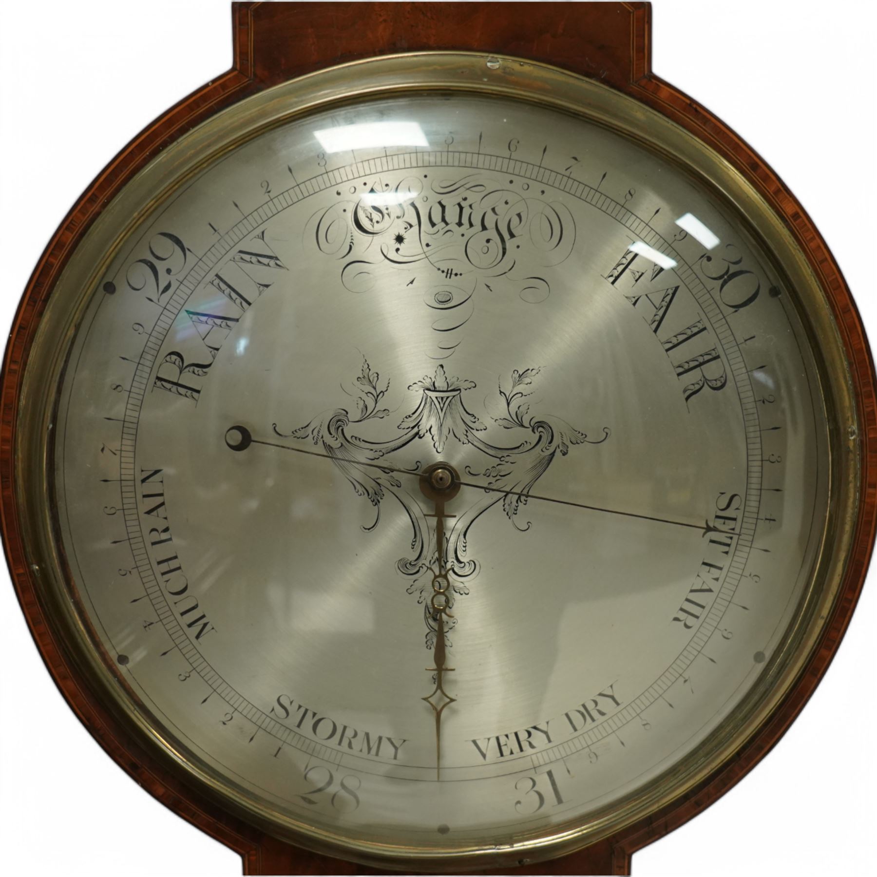 Zanetti of Manchester- late 19th century wheel barometer in a mahogany case with a break arch pediment, brass finial and rounded base, with a hydrometer, spirit bubble and boxed spirit thermometer, 12