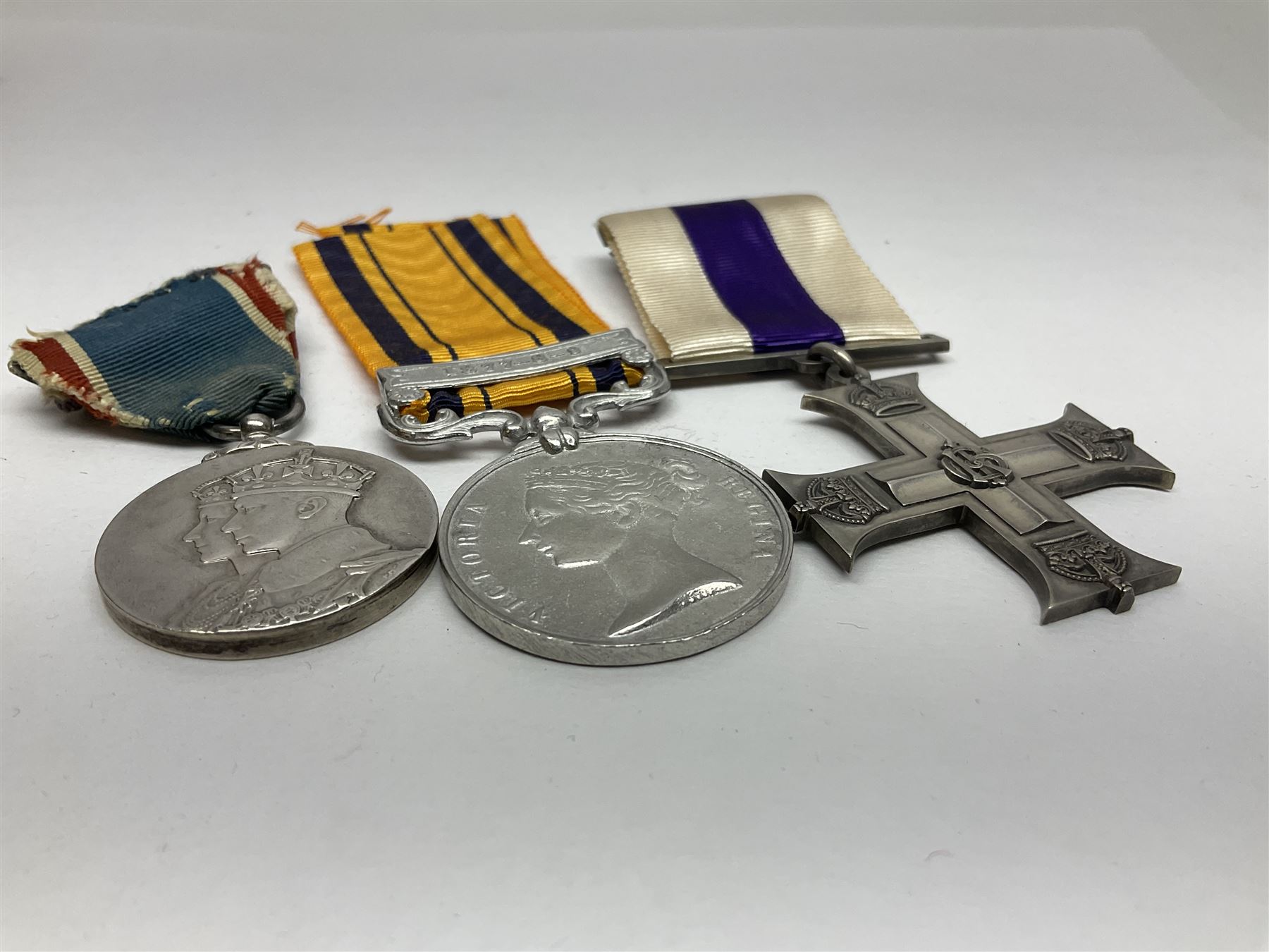 Imperial Service Medal awarded to James Roscow; four coronation medals for Edward VII, George VI and two Elizabeth II (both boxed); George V silver jubilee miniature; and two replica medals - Military Cross and Victoria South Africa 1877-8-9 (8)