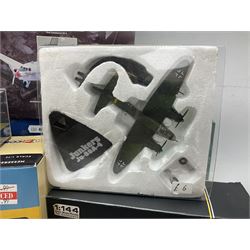 Fifteen modern die-cast models of aircraft by Corgi, Atlas Editions and Ixo including Aviation Archive, War Birds, Fighters of WWII etc; and model of an MGB Sports Car; all boxed (16)